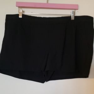 Black pleated shorts